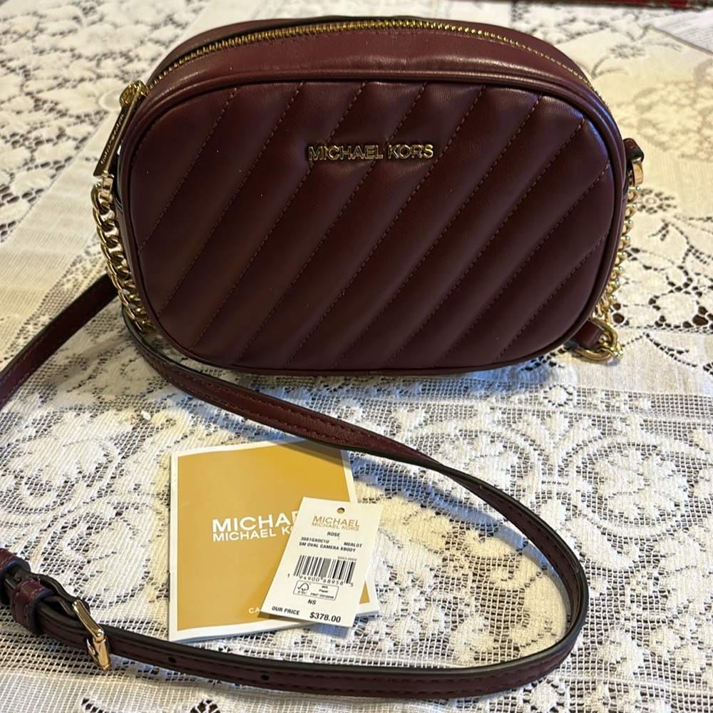 MICHAEL KORS ROSE Small Quilted Oval Camera X-body In MERLOT Vegan Faux Leather